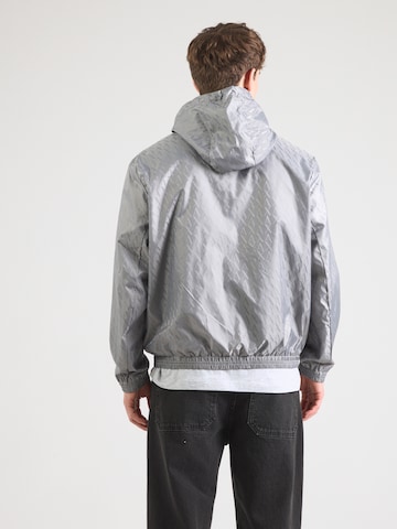 ARMANI EXCHANGE Φθινοπωρινό και ανοιξιάτικο μπουφάν σε γκρι