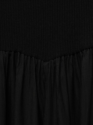 Robes en maille 'Palace' MANGO en noir