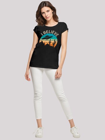 T-shirt 'I Believe UFO Alien Sonnenuntergang' F4NT4STIC en noir
