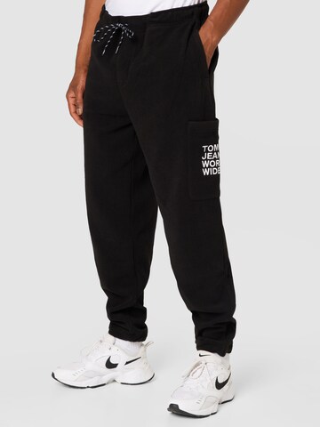 Tommy Jeans Regular Trousers in Black: front