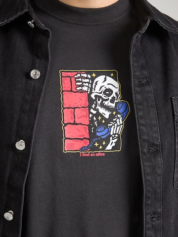 VANS T-Shirt 'FEEL SO ALIVE' in Schwarz