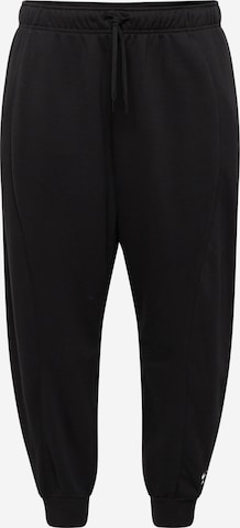 Effilé Pantalon de sport Nike Sportswear en noir : devant