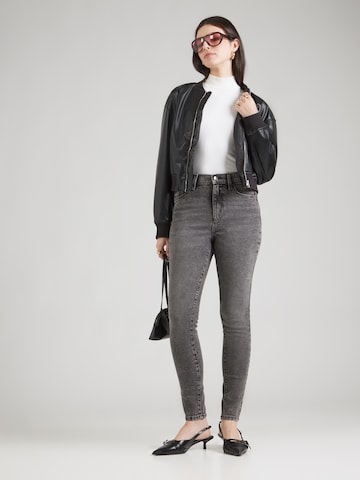 Skinny Jeans de la DKNY pe negru