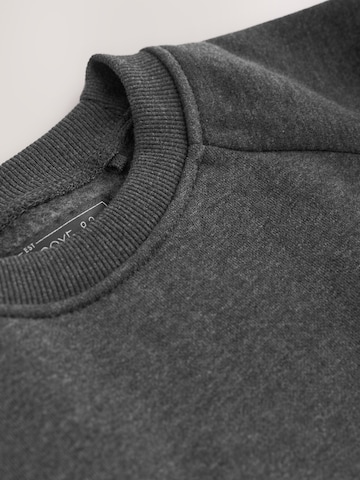 Sweat Next en gris