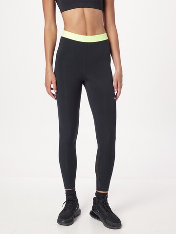 NIKE Skinny Workout Pants in Black: front