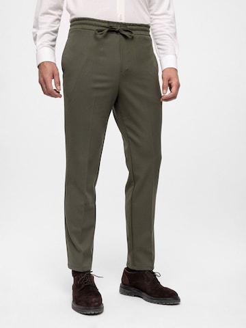 Antioch Loose fit Trousers with creases in Green: front