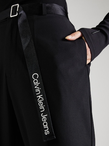 Calvin Klein JeansFlared/zvonoliki kroj Hlače na crtu - crna boja