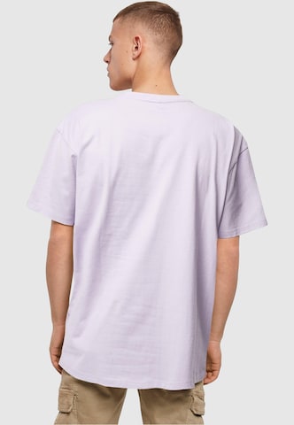 T-Shirt 'But First Coffee' Merchcode en violet