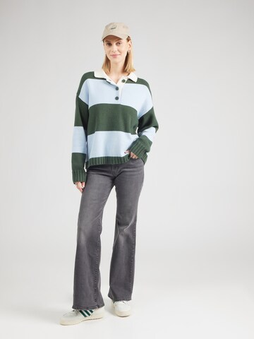 LEVI'S ® Flared Jeans 'SUPERLOW' in Grau