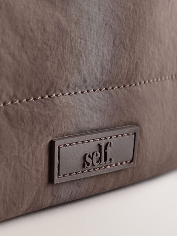 Sac à bandoulière self. en marron