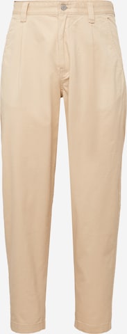 Effilé Pantalon chino Tommy Jeans en beige : devant