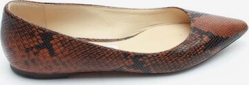 JIMMY CHOO Flats & Loafers in 35 in Brown: front