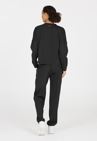 Athlecia Sports sweatshirt in Black