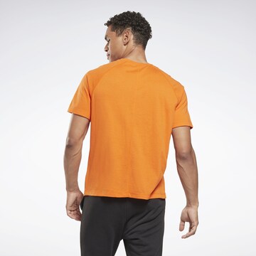 Reebok Funkční tričko – oranžová