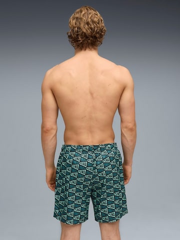 regular Pantaloni sportivi 'Puma Swim Men Printed Flag Mid Shorts 1p' di PUMA in blu