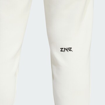 Effilé Pantalon de sport 'Z.N.E. Premium' ADIDAS SPORTSWEAR en blanc