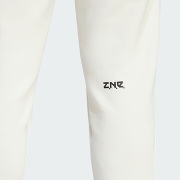 ADIDAS SPORTSWEAR Tapered Sportbroek 'Z.N.E. Premium' in Wit