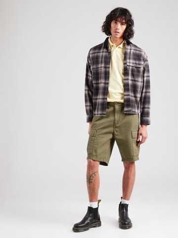 LEVI'S ® Μπλουζάκι 'HOUSEMARK' σε κίτρινο