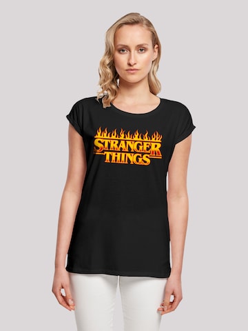 F4NT4STIC Shirt 'Stranger Things Fire Netflix TV Series' in Black: front