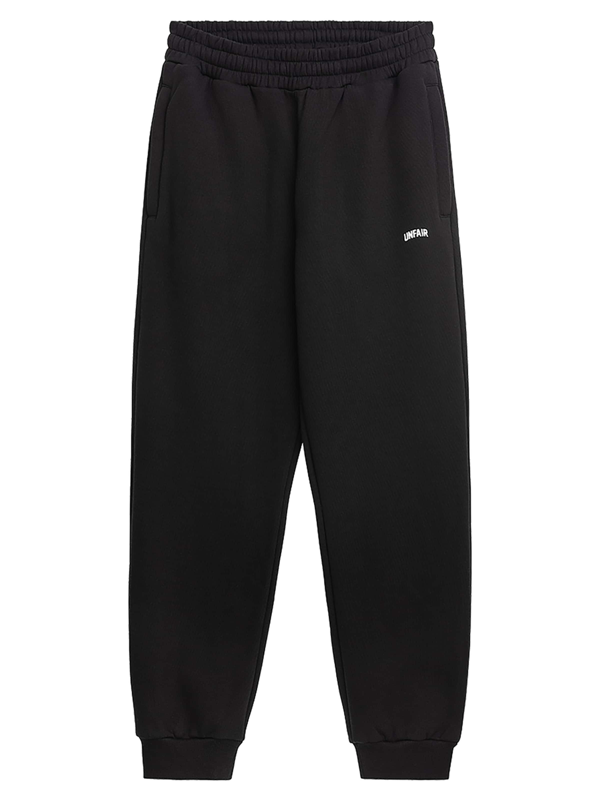 Unfair Athletics Tapered Outdoorbroek 'TTW' in Zwart: voorkant
