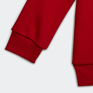 ADIDAS ORIGINALS Regular Tracksuit in Red