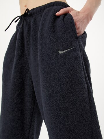 Nike Sportswear Tapered Hose in Schwarz