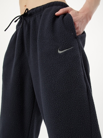 melns Nike Sportswear Pakapēniski sašaurināts piegriezums Bikses