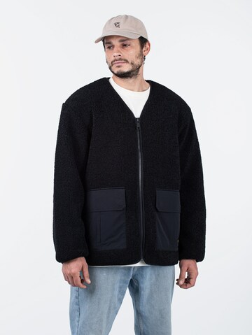 Carhartt WIP Übergangsjacke 'Devin Liner' in Schwarz
