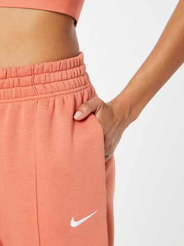 Nike Sportswear Ohlapna forma Hlače | oranžna barva