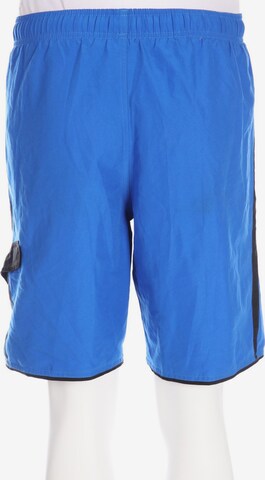 NIKE Sport-Shorts 31-32 in Blau