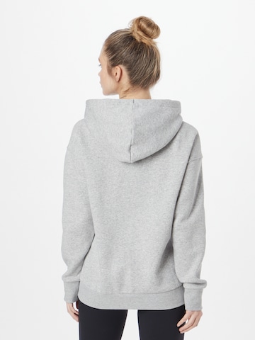 UNDER ARMOUR Sportief sweatshirt 'Essential' in Grijs