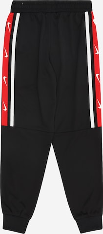 Nike Sportswear Tapered Hose in Schwarz: Vorderseite