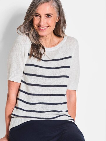 Goldner Pullover in Weiß
