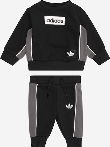 ADIDAS ORIGINALSJogging komplet - crna boja: prednji dio