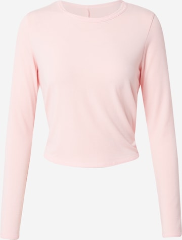 T-shirt fonctionnel Onzie en rose : devant