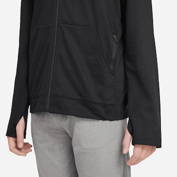 NIKE - Sudadera con cremallera deportiva 'Poly' en negro