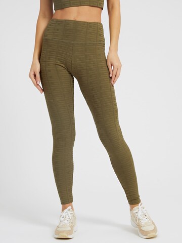 GUESS Slim fit Workout Pants in Green: front