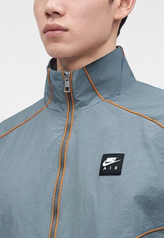 Nike Sportswear Övergångsjacka 'AIR' i grå: framsida