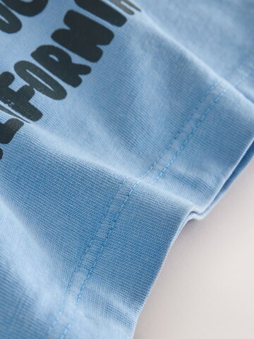 T-Shirt Next en bleu