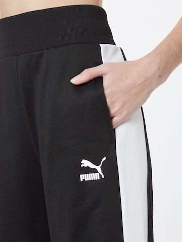 PUMA Lużny krój Spodnie w kolorze czarny