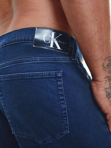 Calvin Klein Big & Tall Tapered Jeans in Blau