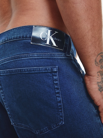 Calvin Klein Big & Tall Tapered Jeans in Blauw