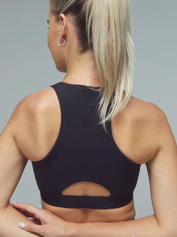 DRILLS Apparel High neck Sports Bra 'XFUNCTION Pocket Bra' in Black