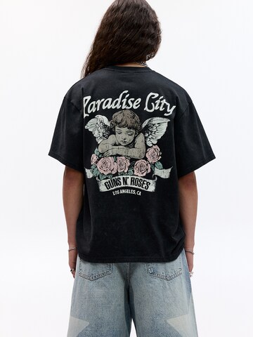 Maglietta 'GUNS PARADISE' di Pull&Bear in nero: frontale