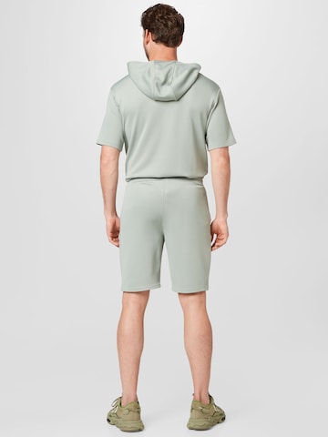 Slimfit Pantaloni sportivi di FILA in grigio