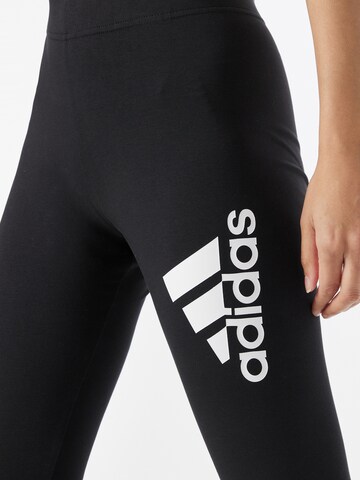 ADIDAS SPORTSWEAR Skinny Workout Pants 'Future Icons Badge Of Sport' in Black