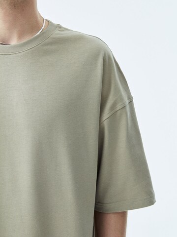 Tricou 'Round Rock' de la VAMOS CLO pe verde