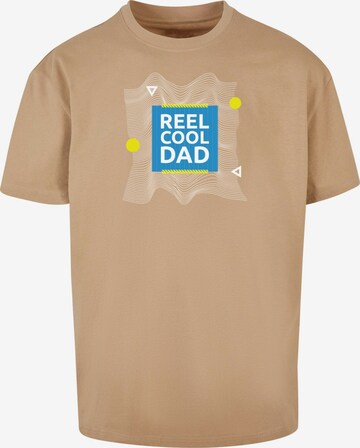 Maglietta 'Fathers Day - Reel Cool Dad' di Merchcode in beige: frontale