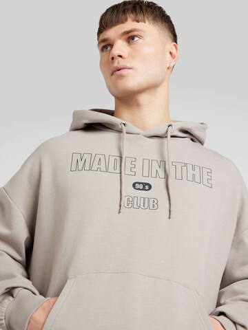 ABOUT YOU Bluzka sportowa 'Malik Hoodie' w kolorze beżowy