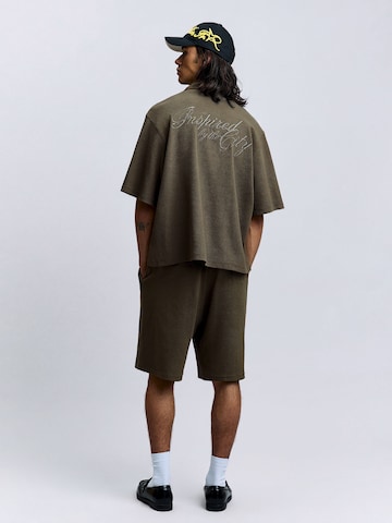 Bershka Trenirka za tek | zelena barva